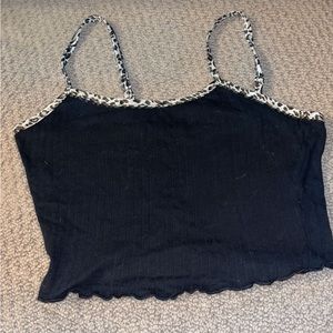 Small black lettuce trim crop top with cheetah print straps